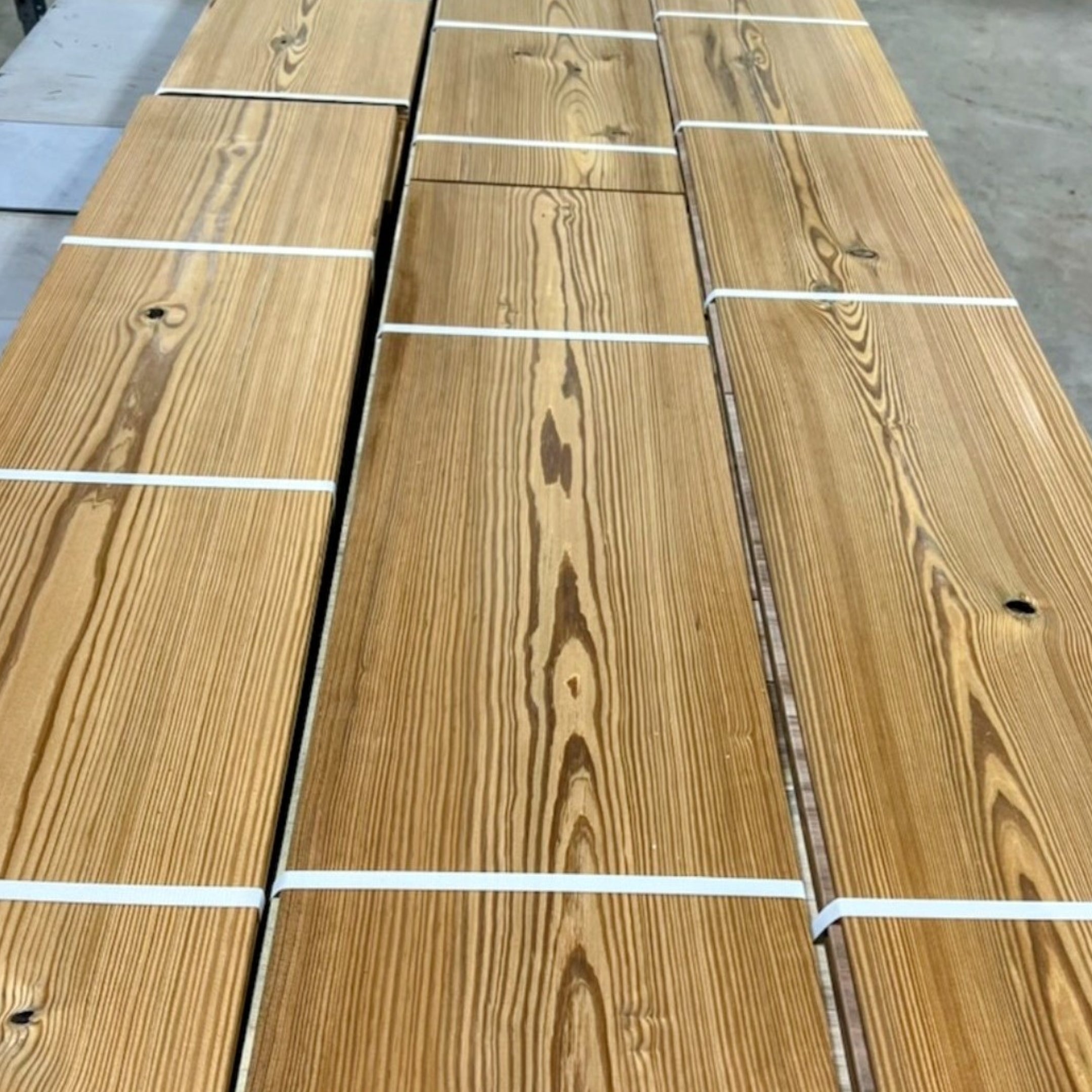 Waterproof Antique Heart Pine flooring — 100% solid wood for concrete slabs, basements, showers, and radiant heat. Thermally modified with just heat and steam