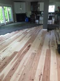 Hickory solid hardwood flooring – mill direct – installed room view, natural hickory grain and color variation