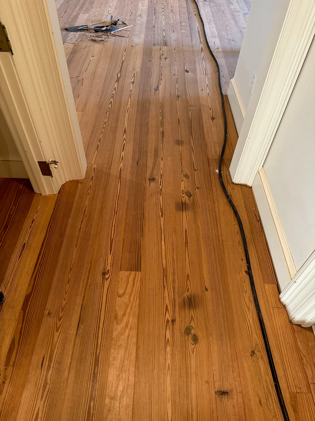 installation of waterproof antique heart pine flooring 